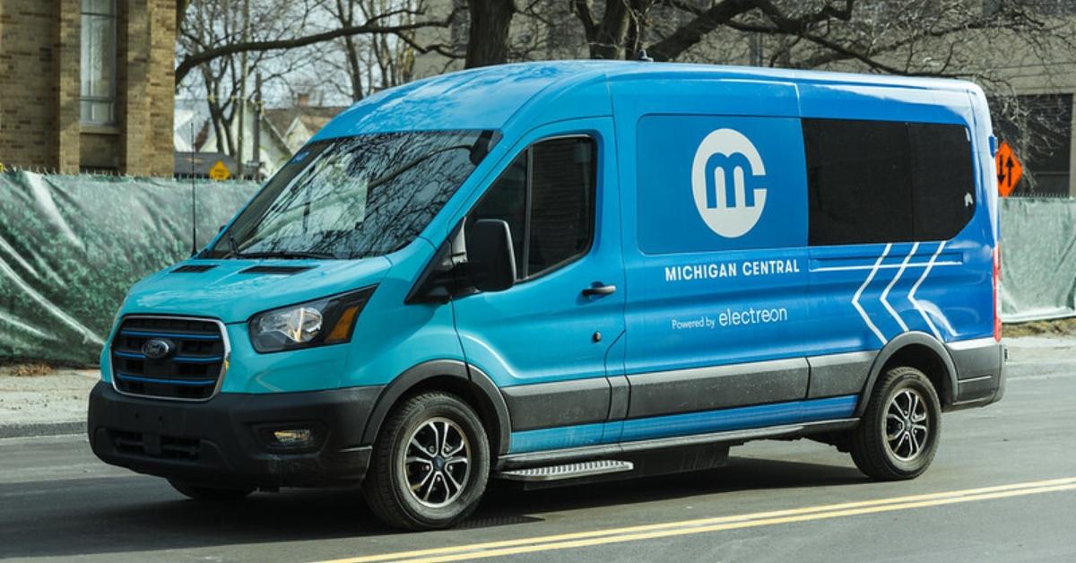 An EV van on Detroit's wireless charging road.